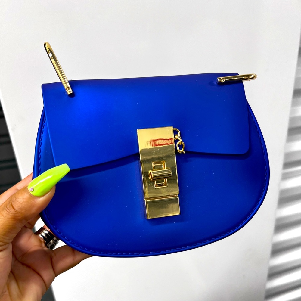 Women Royal blue handbag with long gold chain